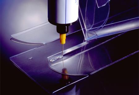 Single Dymax Light Curing Adhesive Dispensing Onto A Slide
